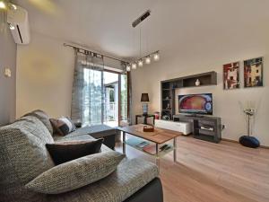TV a/nebo společenská místnost v ubytování Holiday Home M by Interhome