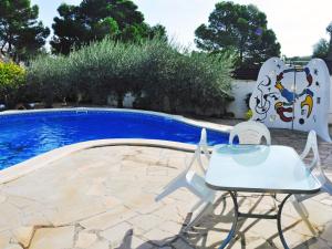 The swimming pool at or close to Villa Escorpion by Interhome