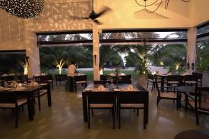 Calamansi Cove Villas 레스토랑 또는 맛집