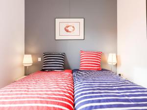 Säng eller sängar i ett rum på Holiday Home Valombre by Interhome