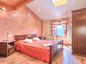 Łóżko lub łóżka w pokoju w obiekcie Holiday Home Darija by Interhome