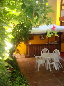Patio nebo venkovní prostory v ubytování Pousada Caravelas