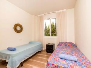 Posteľ alebo postele v izbe v ubytovaní Apartment Golde Gardens by Interhome