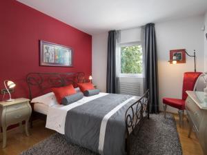 Posteľ alebo postele v izbe v ubytovaní Villa Vlastelini by Interhome