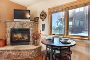 A television and/or entertainment center at Lookout Mountain 27B Condo