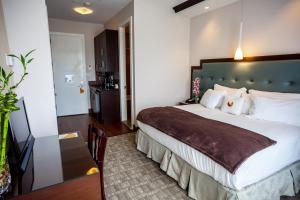 Postel nebo postele na pokoji v ubytování Aura Hotel Brooklyn