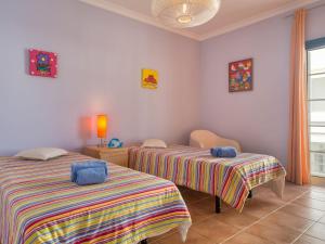 ペーラにあるHoliday Home Grand Beach Hit by Interhomeの2ベッド 2台付きの部屋 +4枚の写真