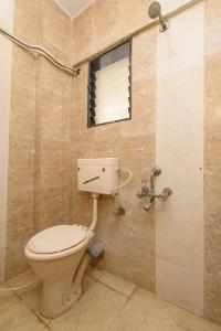 Koupelna v ubytování Hotel Sai Shraddha