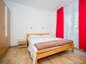 Postel nebo postele na pokoji v ubytování Apartment Hilde Red-5 by Interhome