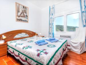 Postel nebo postele na pokoji v ubytování Holiday Home Mirador by Interhome