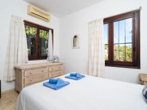 Postel nebo postele na pokoji v ubytování Holiday Home Sunshine by Interhome