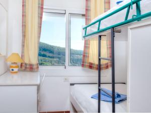 Postel nebo postele na pokoji v ubytování Holiday Home Mirador by Interhome