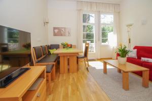 A television and/or entertainment centre at Residence Diana