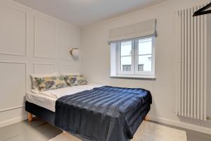 Krevet ili kreveti u jedinici u objektu Dom & House - Apartments Old Town Powroznicza