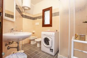 Koupelna v ubytování Villino Funtana + 14 fotografií