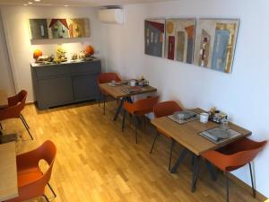 A restaurant or other place to eat at 200 ROOMS & TERRACE