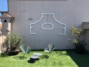A garden outside 200 ROOMS & TERRACE