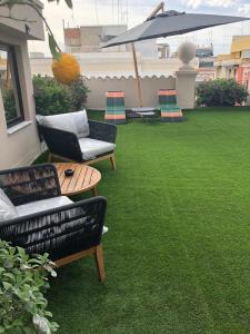 A garden outside 200 ROOMS & TERRACE