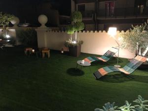 A garden outside 200 ROOMS & TERRACE