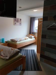 Postel nebo postele na pokoji v ubytování Ferienwohnung Ebeling under stars