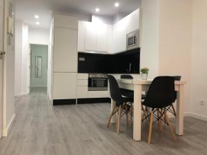 Kuchyň nebo kuchyňský kout v ubytování APARTAMENTOS CAZORLA CENTRO