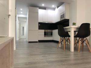Kuchyň nebo kuchyňský kout v ubytování APARTAMENTOS CAZORLA CENTRO