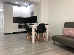 Kuchyň nebo kuchyňský kout v ubytování APARTAMENTOS CAZORLA CENTRO + 9 fotografií