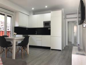 Kuchyň nebo kuchyňský kout v ubytování APARTAMENTOS CAZORLA CENTRO