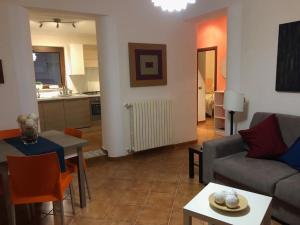 a living room with a couch and a table at A Casa Di Tina in Cassino