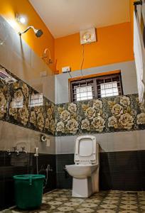 Ванная комната в Sharanyam Homestay