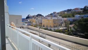 a view of a city from a balcony at VisitPonza - Palazzetto Azzurro in Ponza
