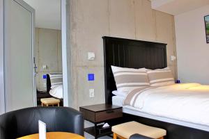 Postel nebo postele na pokoji v ubytování Hotel Stay Interview Jeju