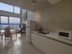 Kuchyň nebo kuchyňský kout v ubytování Hotel Stay Interview Jeju