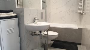 Kúpeľňa v ubytovaní Quo Vadis Apartment + 8 fotografií