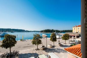 a view of a marina with boats in the water at Adriatic Royal Sea View Apartment in Rovinj