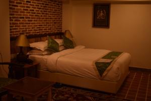 Letto o letti in una camera di Heranya Yala
