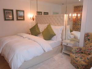 Ένα ή περισσότερα κρεβάτια σε δωμάτιο στο Boutiquehotel Villa Sissi