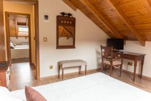 TV a/nebo společenská místnost v ubytování Hotel Ambasmestas
