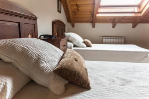 Cama o camas de una habitación en Hotel Ambasmestas
