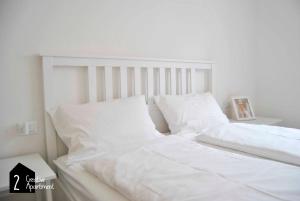 Postel nebo postele na pokoji v ubytování Creative Apartment