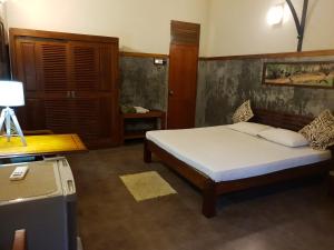 Ein Bett oder Betten in einem Zimmer der Unterkunft Leopard Corridor Yala