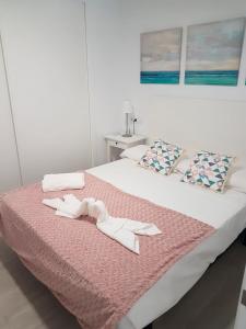 Cama o camas de una habitación en Suncity Flat Pinzón