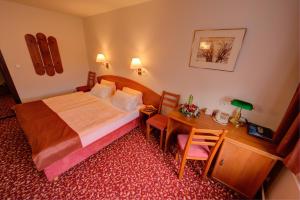 Posteľ alebo postele v izbe v ubytovaní Park Hotel Pruhonice