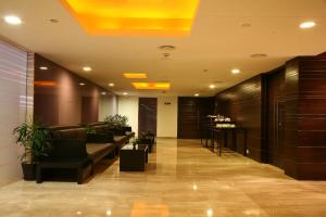The lobby or reception area at Mosaic Hotel, Noida