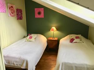Letto o letti in una camera di Gîte la Semois à Mouzaive Vresse sur Semois