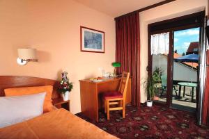 Posteľ alebo postele v izbe v ubytovaní Park Hotel Pruhonice