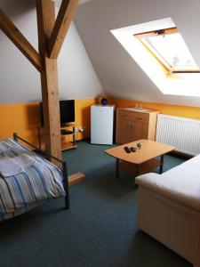 Ένα ή περισσότερα κρεβάτια σε δωμάτιο στο Ubytování Poustka