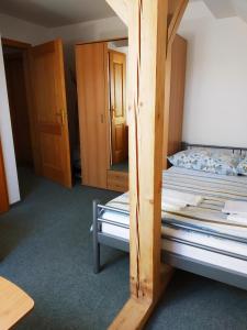 Postel nebo postele na pokoji v ubytování Ubytování Poustka