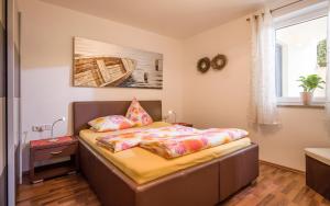 1 dormitorio con 1 cama en una habitación en Appartement Hoschek en Scheffau am Wilden Kaiser