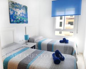 Posteľ alebo postele v izbe v ubytovaní Apartamento La Morera